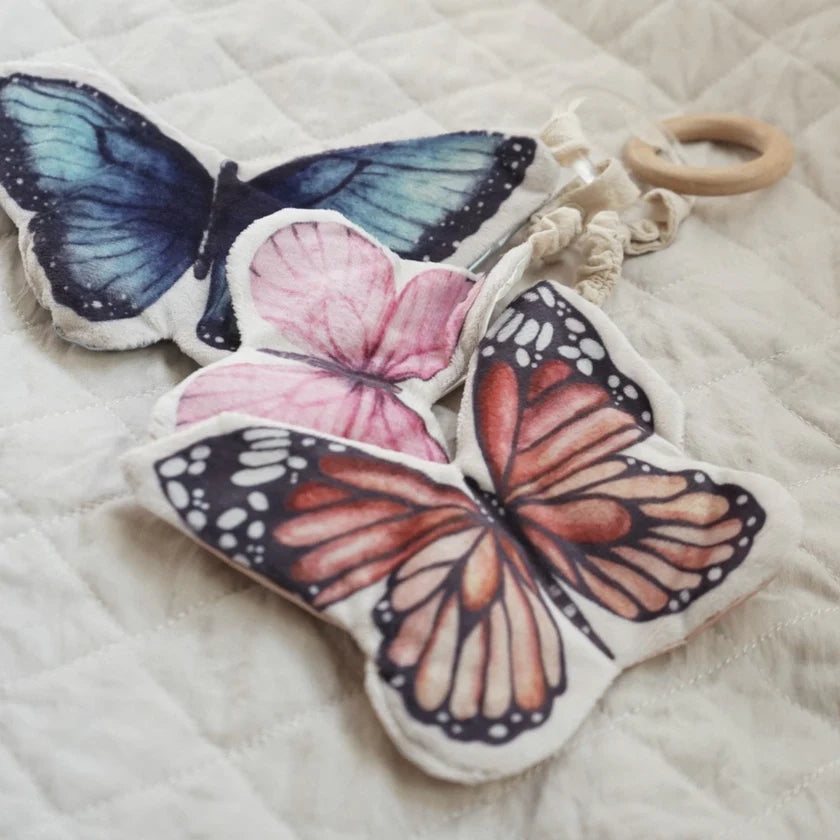 butterfly baby toy set flat lay soft colourful fabric shapes