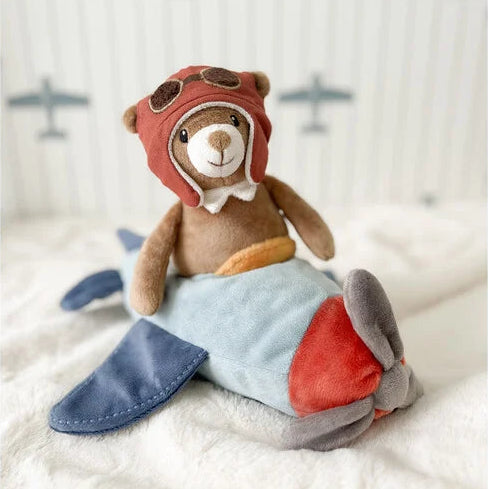 lifestyle image From the brand mon ami Set on a soft aeroplane and dressed in a classic pilot helmet, this sweet bear pilot 