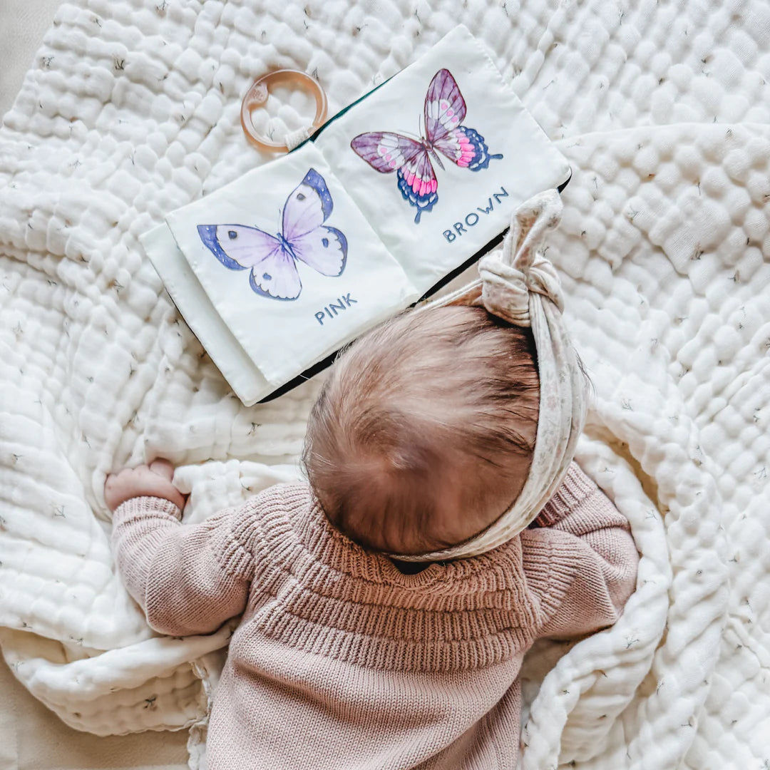 Soft fabric baby book with butterfly illustrations